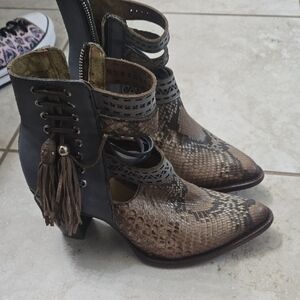 Chic Snakeskin and Black Heeled Boots